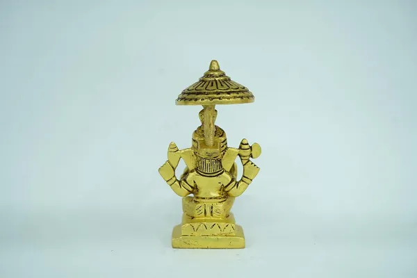 Golden_Ganesha_Brass_Statue_Idol_With_Chatri,_Religious_Figurine,_Traditional_Style,_Brass_Material,_For_Home_Temple_Decor_&_Gifting,_12Cm_Height_X_5Cm_Width