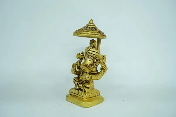 Golden_Ganesha_Brass_Statue_Idol_With_Chatri,_Religious_Figurine,_Traditional_Style,_Brass_Material,_For_Home_Temple_Decor_&_Gifting,_12Cm_Height_X_5Cm_Width