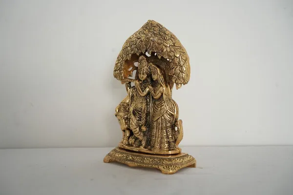 Golden_Radha_Krishna_With_Cow_Standing_Under_Tree_-_0.550_Kg_-_H_21_Cm,_L_14_Cm,_B_5.5_Cm_-_Metal_Home_Decor_&_Gifts_Playing_Flute_Religious_Figure
