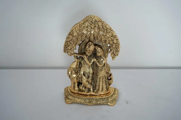 Golden_Radha_Krishna_With_Cow_Standing_Under_Tree_-_0.550_Kg_-_H_21_Cm,_L_14_Cm,_B_5.5_Cm_-_Metal_Home_Decor_&_Gifts_Playing_Flute_Religious_Figure