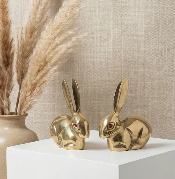 Brass_Rabbit_Figurines_Set_of_2,_Gold_Finish,_Decorative_Bunny_Statues_with_Red_Eyes,_Home_Decor_Accents