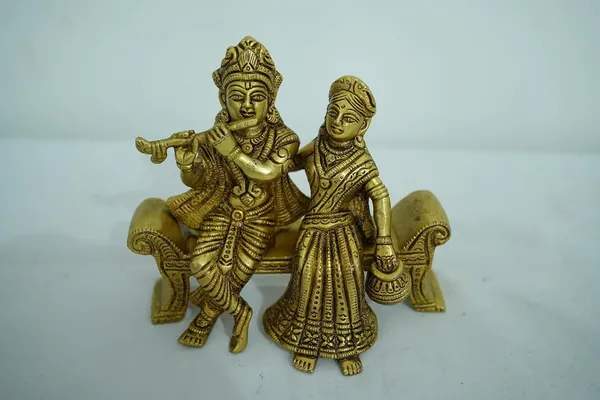 Golden_Radha_Krishna_Brass_Idol_Sitting_On_Bench_Decorative_Statue_Showpiece_Finish_15Cm_X_16Cm_weight_-1.3kg