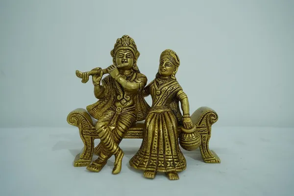 Golden_Radha_Krishna_Brass_Idol_Sitting_On_Bench_Decorative_Statue_Showpiece_Finish_15Cm_X_16Cm_weight_-1.3kg