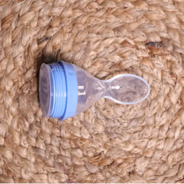 Bottle_Squeezer_Spoon_-Bpa_Free_,_Food_Grade_Silicon__For_Babies_-_Color_may_Vary