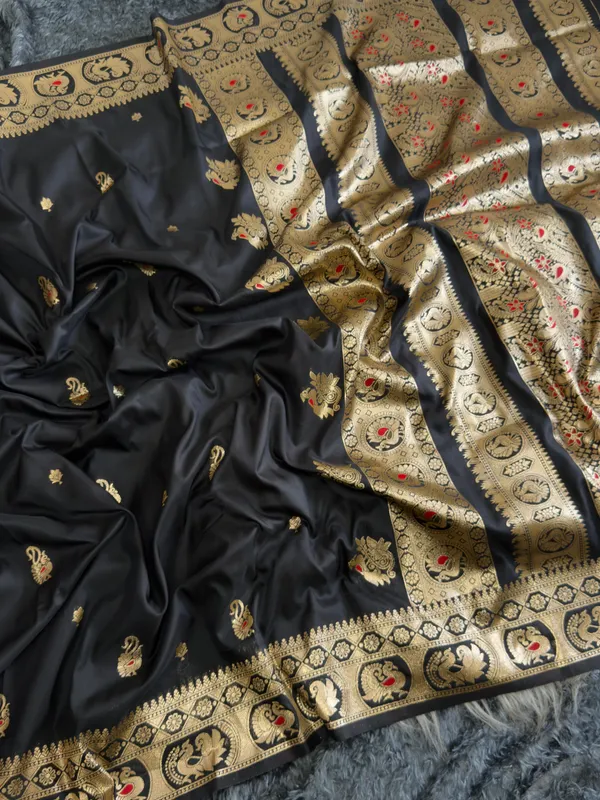 Draped_in_a_classic_black_Banarasi_Bomkai_silk_saree