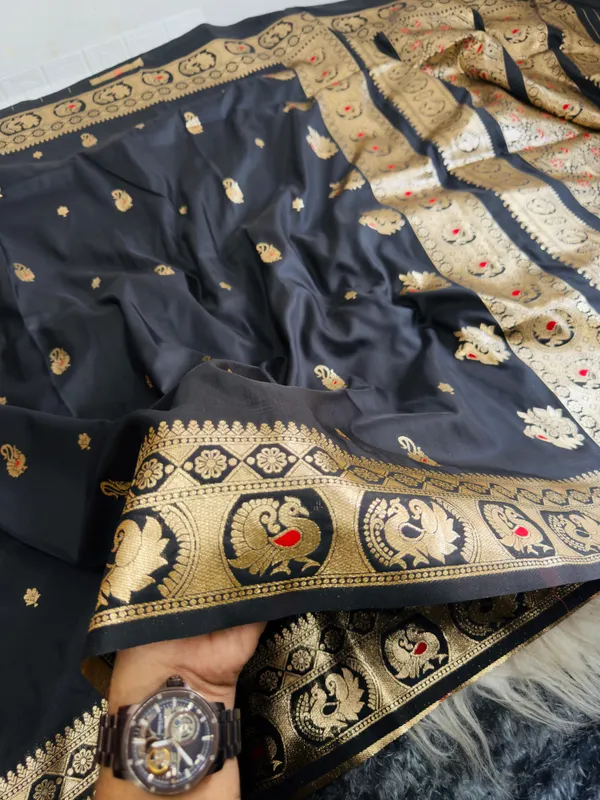 Draped_in_a_classic_black_Banarasi_Bomkai_silk_saree