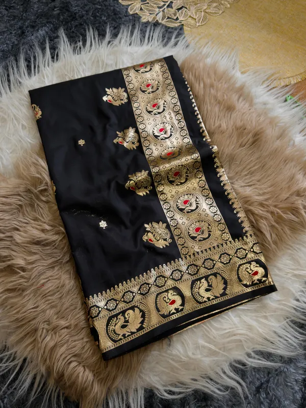 Draped_in_a_classic_black_Banarasi_Bomkai_silk_saree