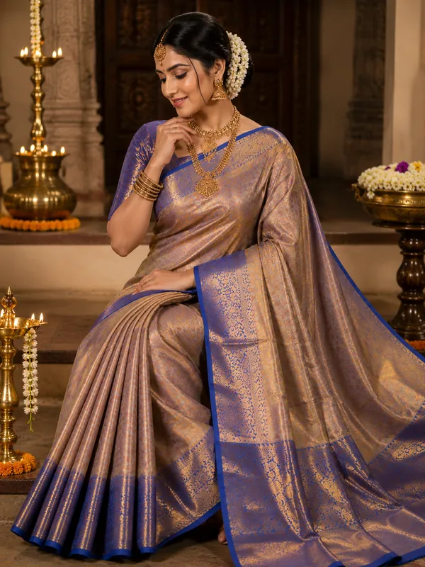 Premium_Pattu_Tissue_Silk_Saree_crafted_with_a_rich_shimmering_finish_and_elegant_woven_texture,_designed_for_graceful_festive_and_wedding_wear._The_saree_features_a_luxurious_soft_drape_with_intricate_detailing_that_enhances_its_royal_appeal._Paired_with_a_matching_blouse_piece_for_a_complete_traditional_look.