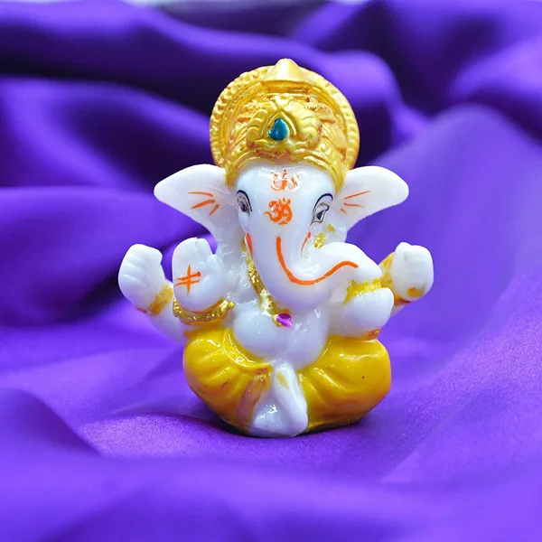 Gifts_Lord_Ganesha_Beautiful_Car_Dashboard_Idol_Figurine_Showpiece_Sculpture_Hindu_Good_Luck_God_Statues_(Yellow,_2_Inch).