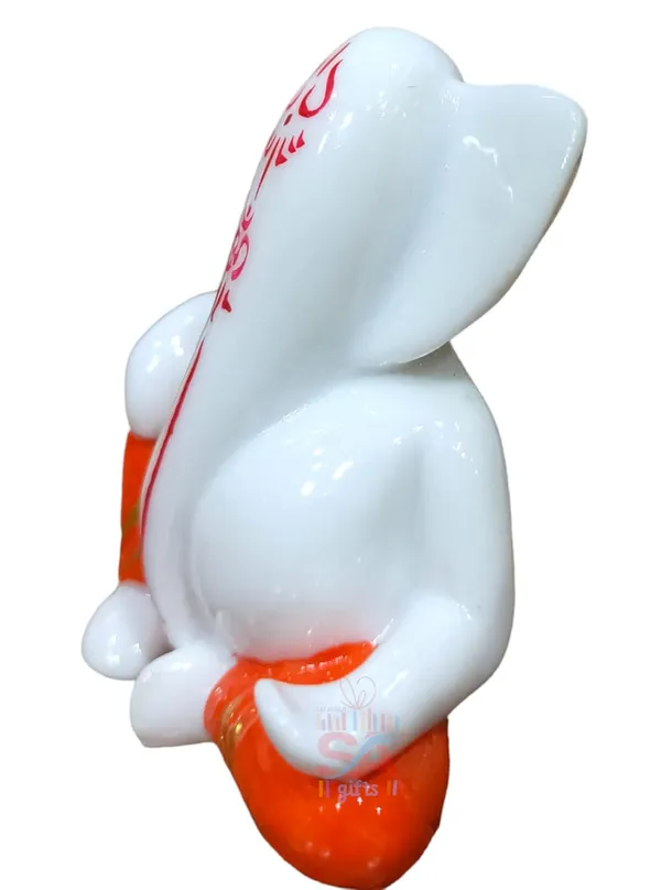 Tilak_Ganesh_Idol_for_Car_Dashboard,_Small_Marble_Idol_God_Ganesha_Statue_Murti_Ganpati_Idol_Figurine_(Red_and_White)