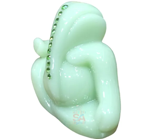Tilak_Ganesh_Idol_for_Car_Dashboard,_Small_Marble_Idol_God_Ganesha_Statue_Murti_Ganpati_Idol_Figurine_(Radium_Glowing_in_Night)