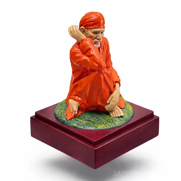 Sai_Baba_Sitting_Statue_Idol_|_Premium_Quality_Decorative_Showpiece_|_Home_Temple,_Office_&_Gift_Item_|_5_Inch_(Orange)