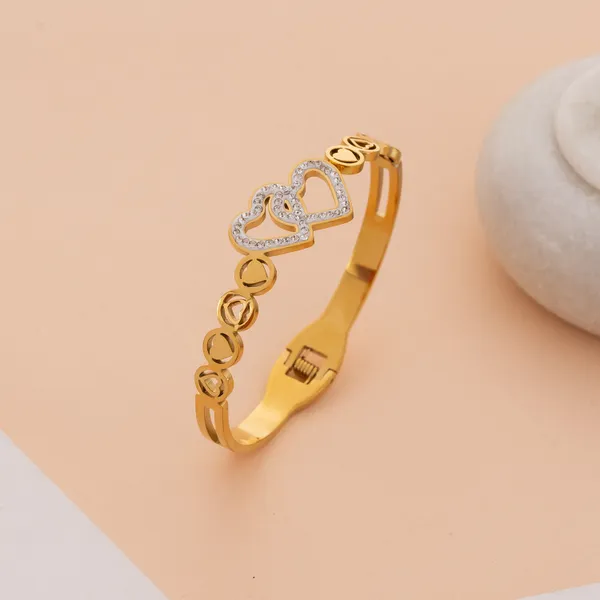 Golden_Stainless_Steel_Shimmering_Heart_Statement_Bracelet_For_Women
