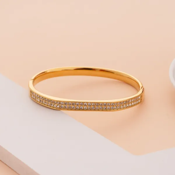 Golden_Stainless_Steel_Sparkling_Eternity_Bangle_Bracelet_For_Women