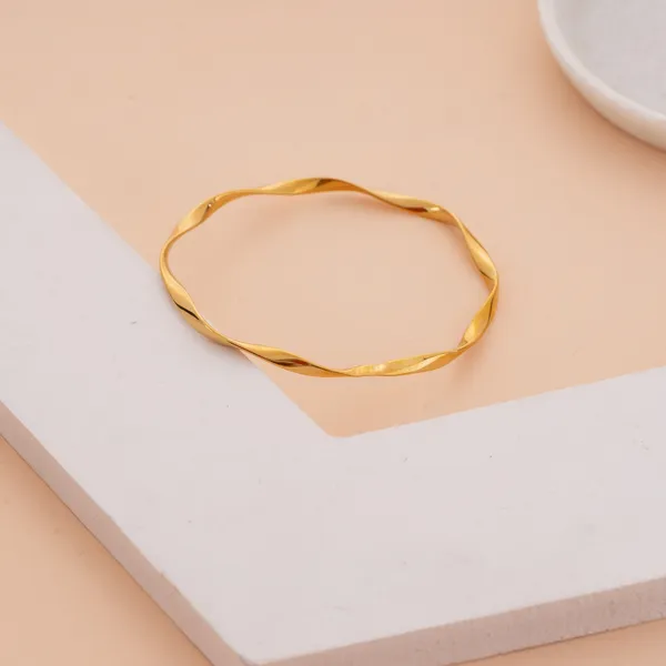 Golden_Stainless_Steel_Elegant_Twisted_Texture_Bracelet_For_Women