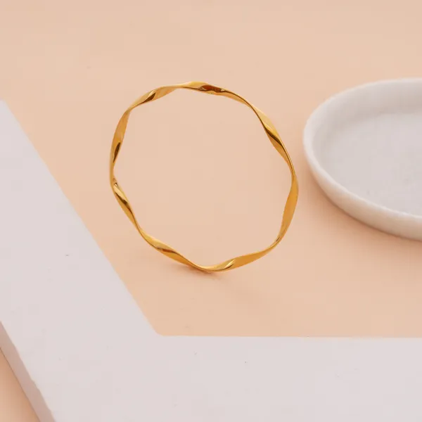 Golden_Stainless_Steel_Elegant_Twisted_Texture_Bracelet_For_Women