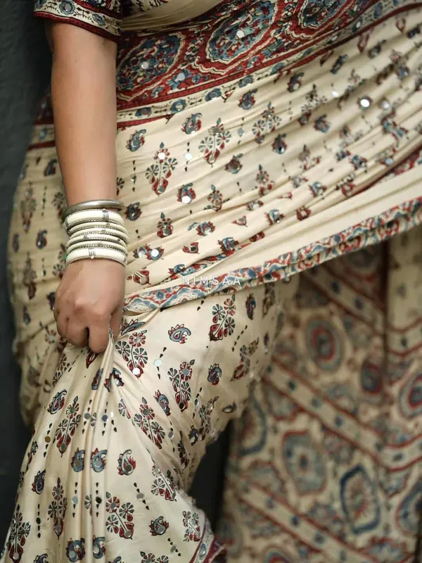 Elegant_Cream_Ajrakh_Print_Modal_Silk_Saree_with_Real_Mirror_Wark_Traditional_Border