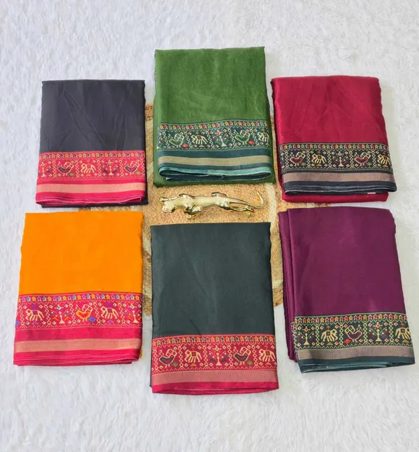 Traditional_Patola_Border_Saree_With_Plain_Body_Dola_Silk_Saree_-_Green