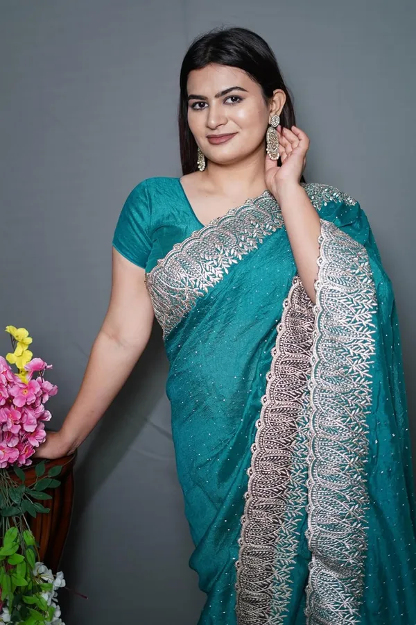 Turquoise_Blue_Women'S_Georgette_Saree_With_Golden_Embroidery,_Heavy_Lace_Border,_Blouse_Piece