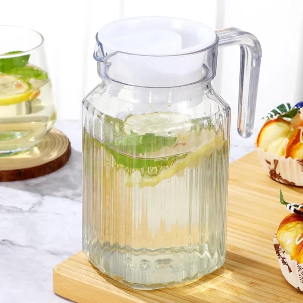 Premium_500ML_Glass_Water_Jug_Set_of_2,_Pitcher_with_Plastic_Lid,_Fridge_Jug_with_Handle,_Practical_Juice_Containers_Easy_to_Use_Milk_Jug,_Iced_Tea,_Cocktails,_Water,_Beverages_(0.5L_Lining_Jug)
