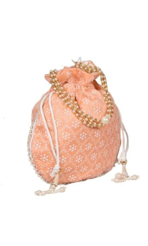 Pack_Of_2_Orange_Chikankari_Raw_Silk_Drawstring_Rajasthani_Style_Potli_Bag_|_Bridal_Clutch_Purse_For_Women