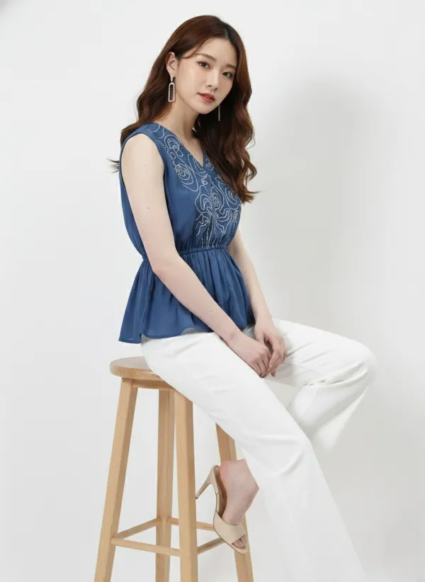 Blue_Embroidered_V-Neck_Peplum_Top_For_Women