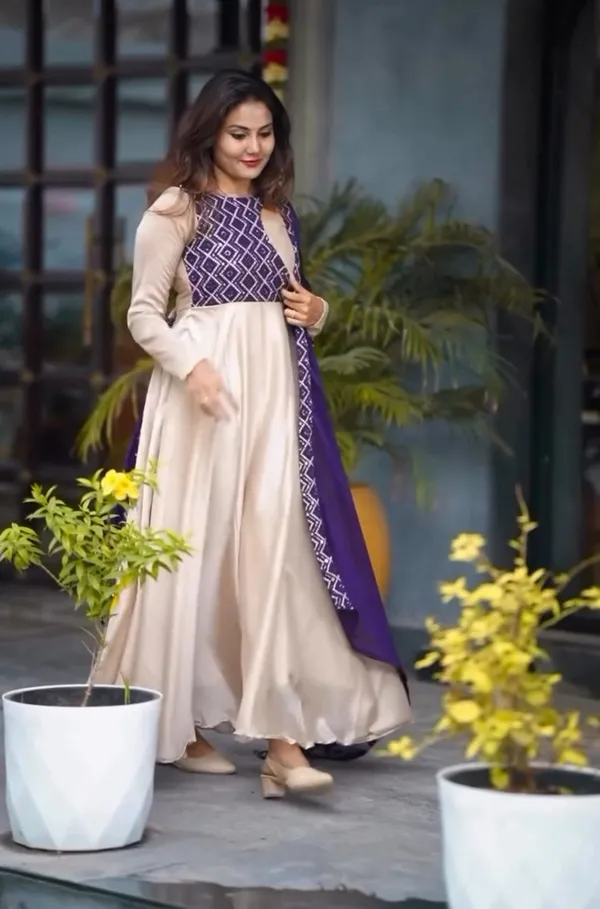 Look_Flawless_In_Purple_Glossy_Georgette_paired_with_a_Mono-Chorme_dupatta_with_beautiful_embroidery_detailing_that_completes_the_look!