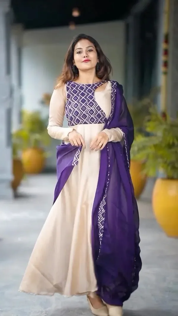 Look_Flawless_In_Purple_Glossy_Georgette_paired_with_a_Mono-Chorme_dupatta_with_beautiful_embroidery_detailing_that_completes_the_look!