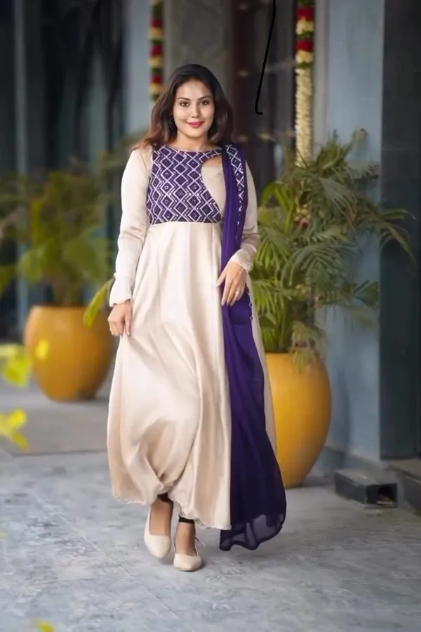 Look_Flawless_In_Purple_Glossy_Georgette_paired_with_a_Mono-Chorme_dupatta_with_beautiful_embroidery_detailing_that_completes_the_look!