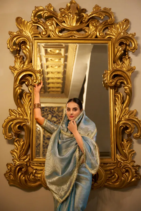 Sky_Blue_Tissue_Silk_Saree_With_Rich_Golden_Zari_Border