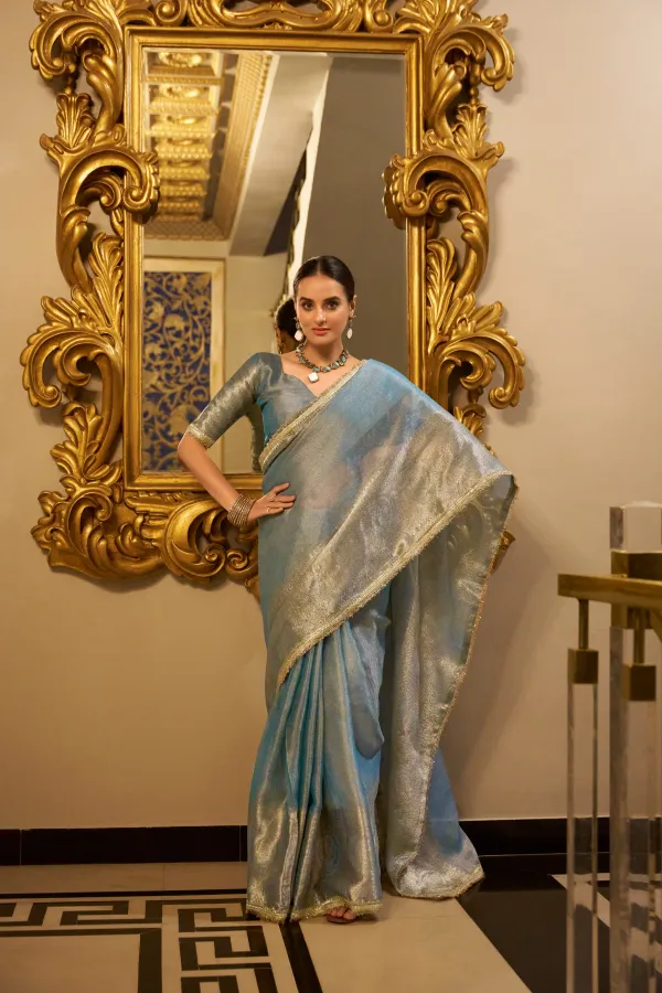 Sky_Blue_Tissue_Silk_Saree_With_Rich_Golden_Zari_Border