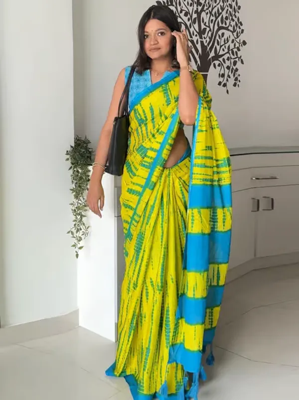 Vasudha_Pure_Cotton_Saree_–_Elegant_Teal_Blue_with_Ethnic_Border