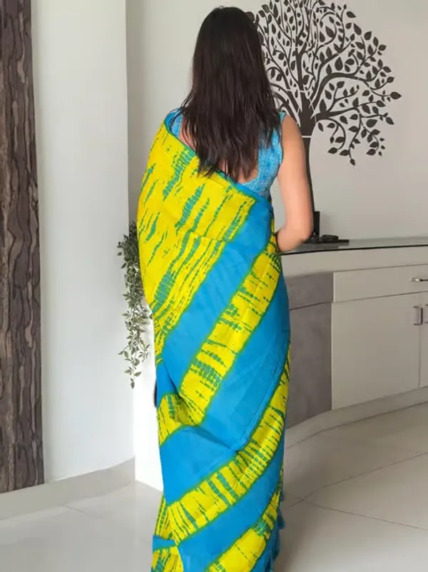 Vasudha_Pure_Cotton_Saree_–_Elegant_Teal_Blue_with_Ethnic_Border