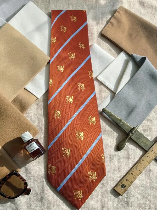 Regency_Crest_Rust_Brown_And_Sky_Blue_Micro_Woven_Jacquard_9_Cm_Tie_Set_With_Pocket_Square_And_Premium_Wooden_Gift_Box
