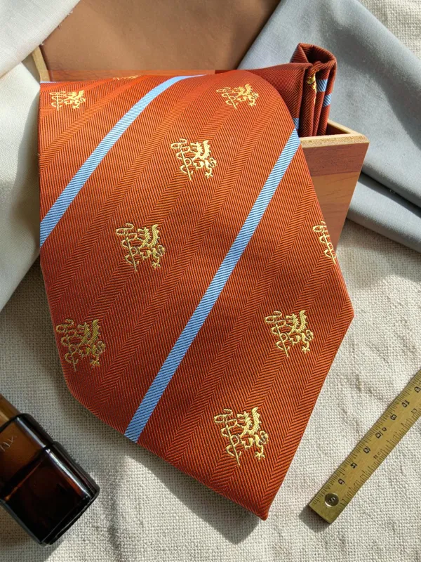 Regency_Crest_Rust_Brown_And_Sky_Blue_Micro_Woven_Jacquard_9_Cm_Tie_Set_With_Pocket_Square_And_Premium_Wooden_Gift_Box