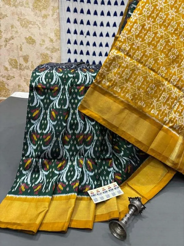 Green_Beautiful_Ikkat_Design_Silk_Saree_Premium_Zari_Border_Saree_For_Women