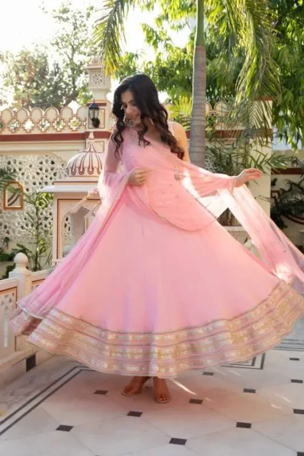 Iconic_Baby_Pink_Natural_Crepe_Anarkali_Gown_with_Heavy_Flair_and_Dori_Work_Mirror_Dupatta_with_lace_work