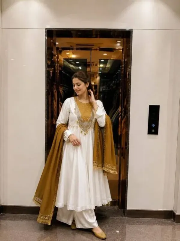 Mustard_Yellow_Anarkali_Suit_with_Sequin_Work_and_Star_Georgette_Dupatta