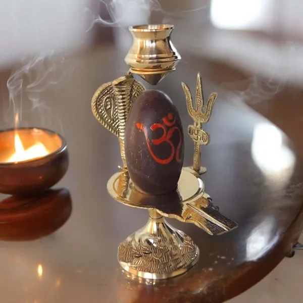 5.3_Inch_Narmadeshwar_Shivling/Shiva_Pindi_With_Brass_Trishul_Sheshnaag_&_Temple_Stand