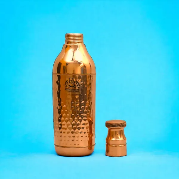 Royalstuffs_Handcrafted_Copper_Water_Bottle_1200_Ml_Hammered_Polish_Water_Bottle_Leak_Proof_Copper_Bottle_Champagne_Shape_For_Water