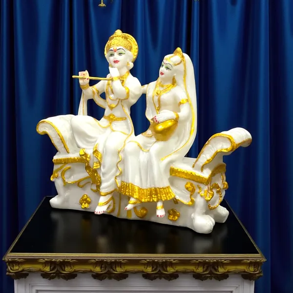 Cream_Radha-_Krishna_Sitting_On_Sofa_Marble_Look_Idol_Murti_Statue_Best_For_Drawing_Room