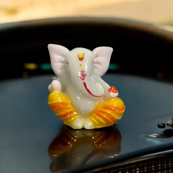 White_&_Orange_Lord_Cute_Ganesha_Idol_Lucky_Ganesh_Idol_For_Vehicle_Car_Dashboard_Gifting_Office_Puja_Decor