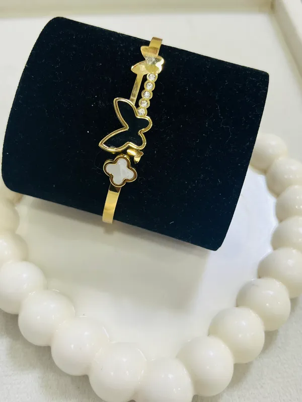 Golden_Statement_Butterfly_And_Clover_Cuff_For_Women