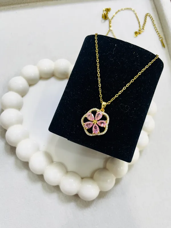 Golden_Flower_Pendant_With_Pink_Stones_For_Women