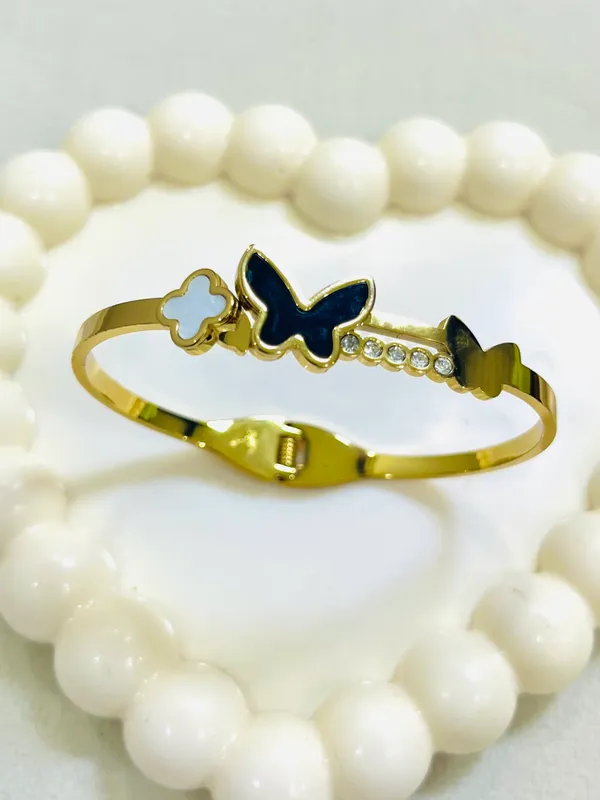 Golden_Statement_Butterfly_And_Clover_Cuff_For_Women