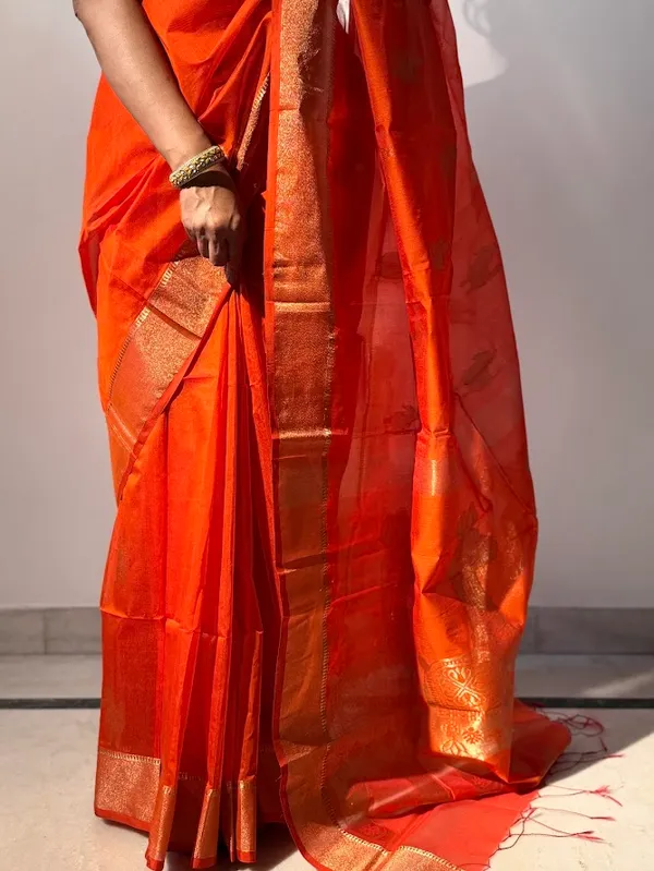 Bright_Orange-Red_Festive_Handloom_Cotton__Silk_Saree_with_Metallic_Copper_Horse_Motifs_&_Zari_Border