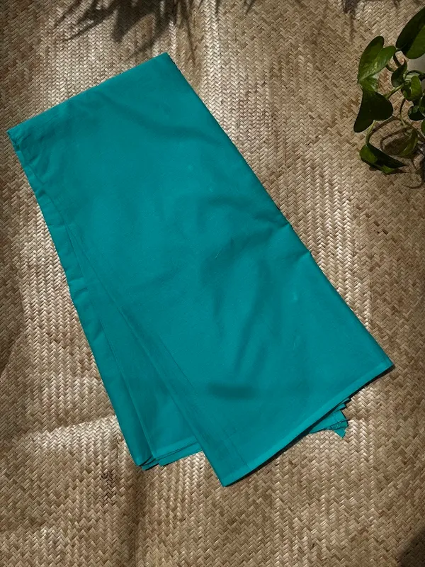 Aqua_Teal_Plain_Mulmul_Saree_with_Fabric_Tassels