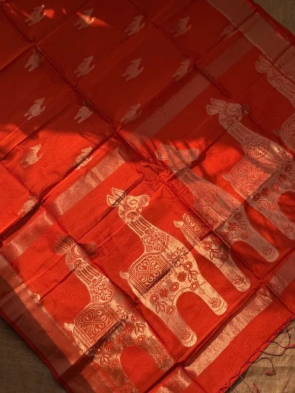 Bright_Orange-Red_Festive_Handloom_Cotton__Silk_Saree_with_Metallic_Copper_Horse_Motifs_&_Zari_Border