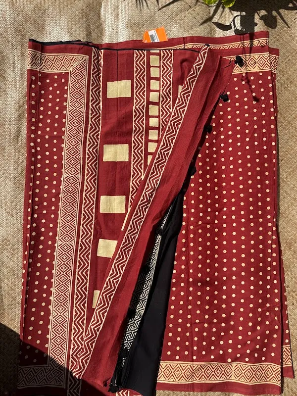 Crimson_Red_Polka_Mulmul_saree_with_fabric_tassels