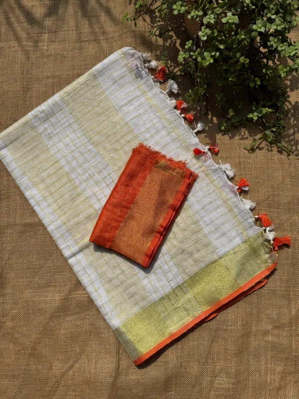 The_Onam_Aurora:_Off-White_Zari_Linen_Saree_with_Sunset_Orange_Blouse